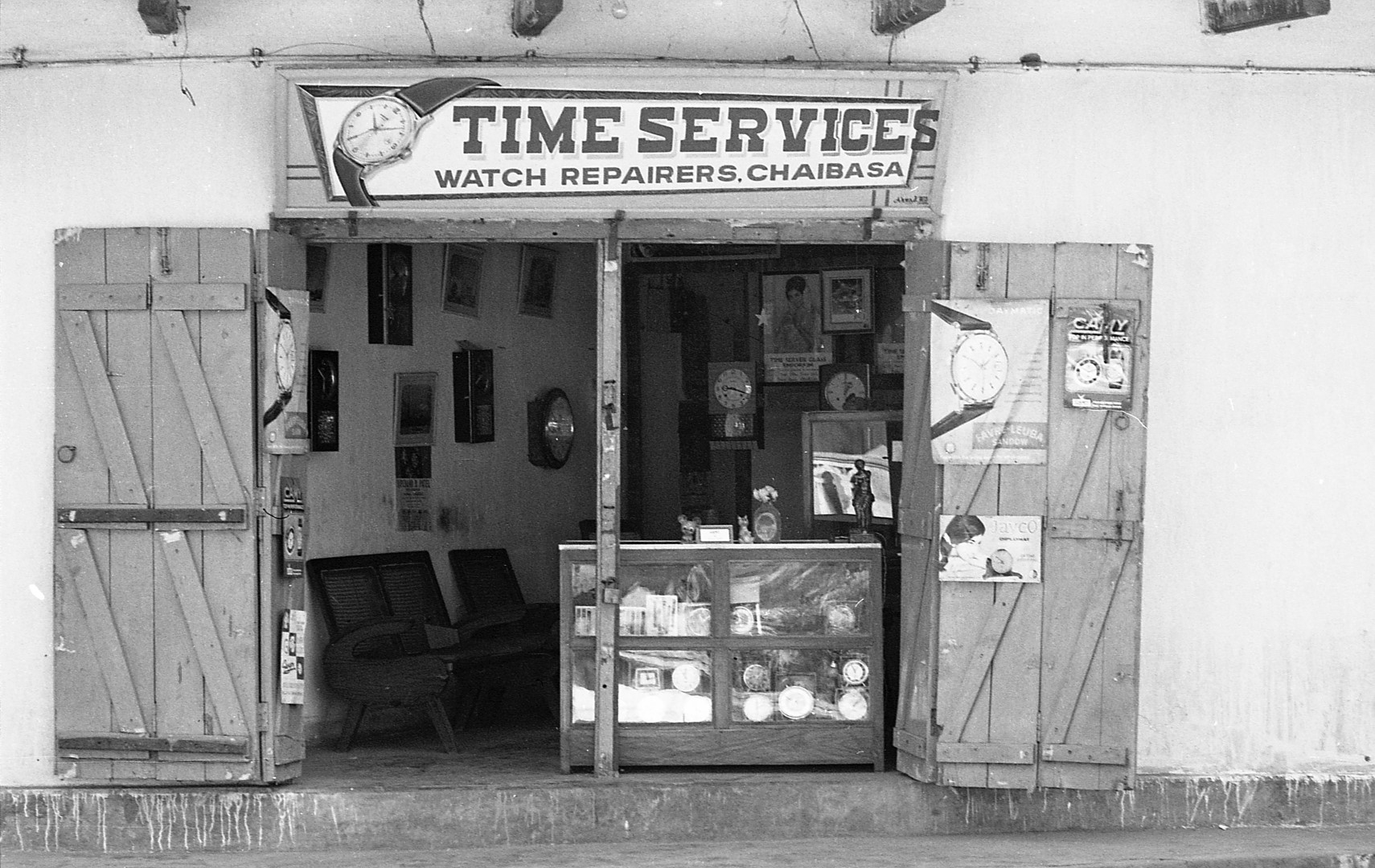 Time Service, Watch Repair shopsign in Chaibasa high street.